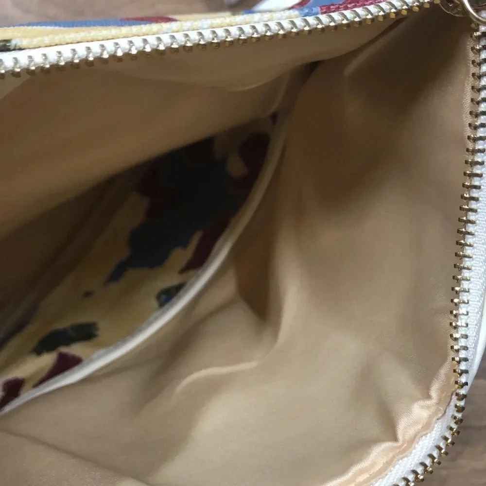 RACHEL Pally floral clutch with beauty samples